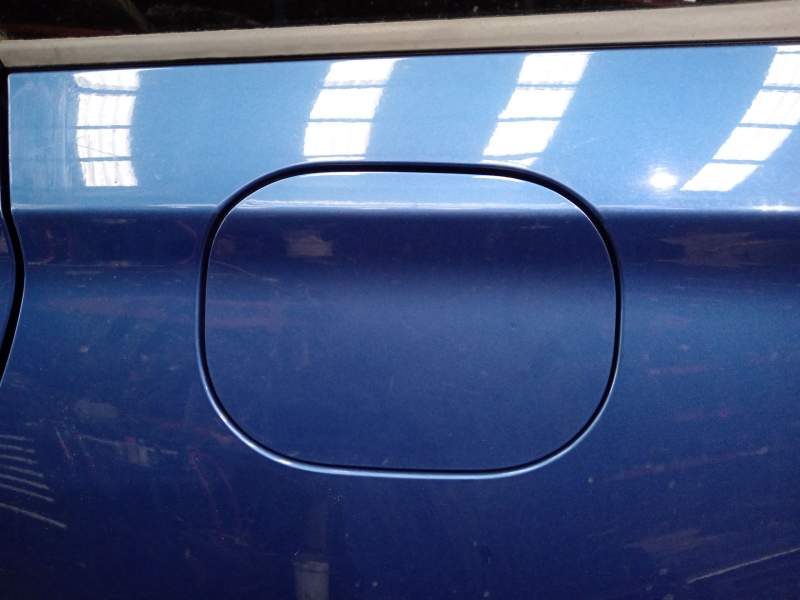TAPA EXTERIOR COMBUSTIBLE 