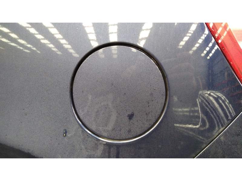 TAPA EXTERIOR COMBUSTIBLE 