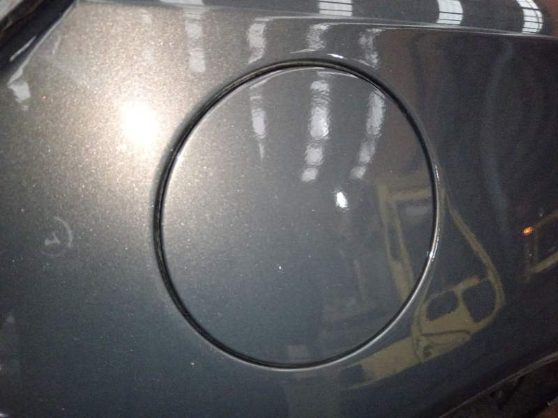 TAPA EXTERIOR COMBUSTIBLE 