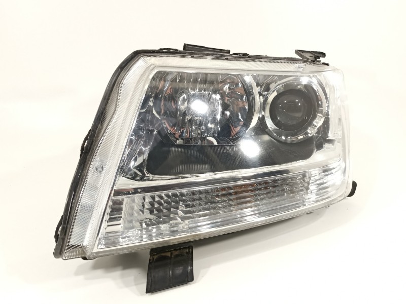 Recambio de faro izquierdo para suzuki grand vitara jb (jt) 1,9 ltr. ddis jlx-e 5-türig referencia OEM IAM 10059079  
