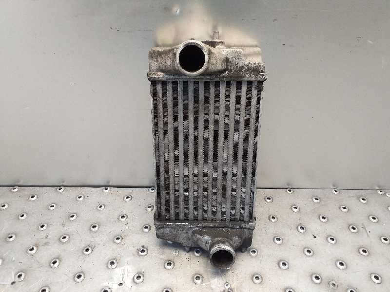 Recambio de intercooler para chrysler voyager (rg) 2.5 grand voyager limited warner bros referencia OEM IAM 1072868503A 83403D28