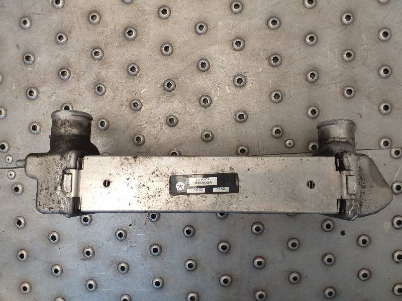 Recambio de intercooler para chrysler voyager (rg) 2.5 grand voyager limited warner bros referencia OEM IAM 1072868503A 83403D28