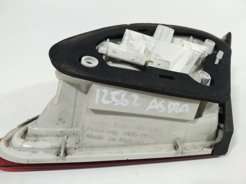 Recambio de piloto trasero izquierdo en porton para opel astra j lim. selective business referencia OEM IAM 13306455  